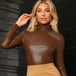 Brand new faux leather brown long sleeve shirt.